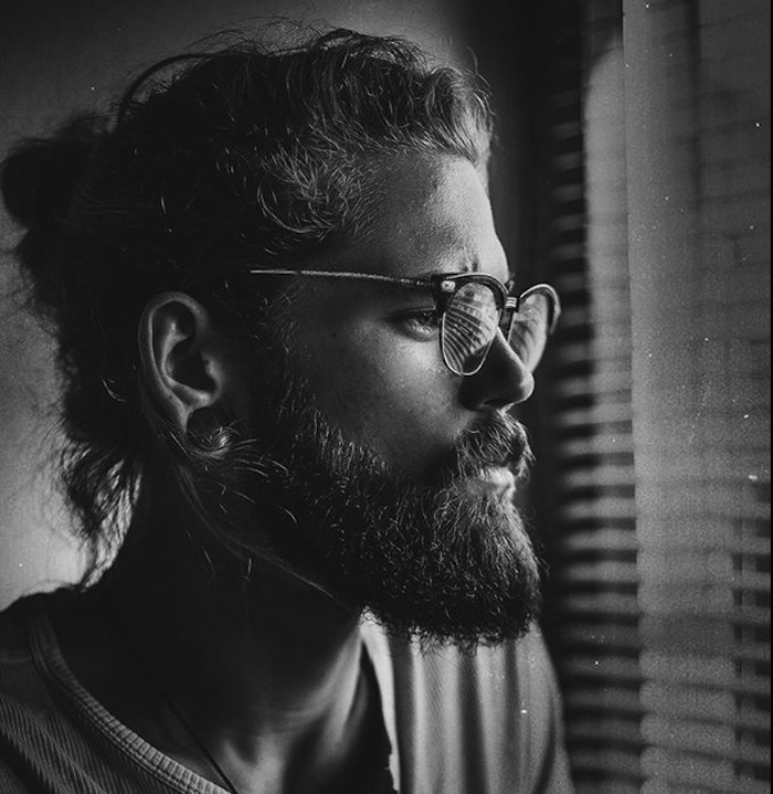 Man Bun Hairstyles For Long Straight Hair with Long Curly Beard