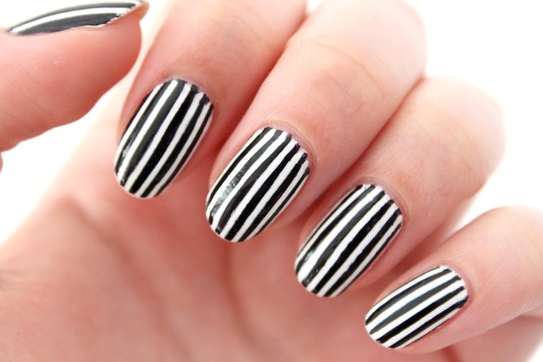 10. Simple White and Gold Striped Nail Design for Short Nails - wide 5