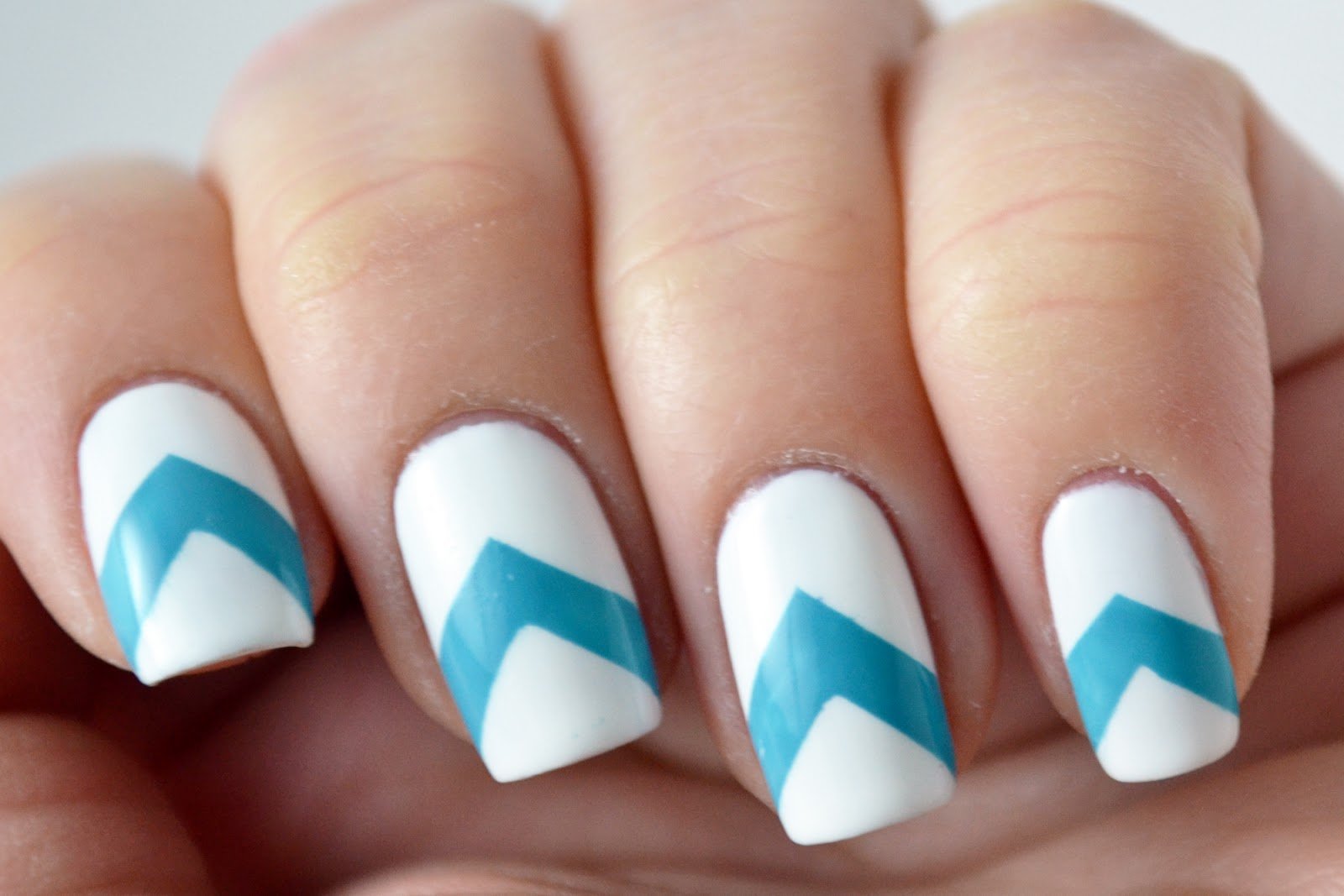 10. Simple White and Gold Striped Nail Design for Short Nails - wide 11