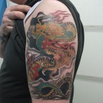 Cool Dragon Tattoos For Men on Half Sleeve