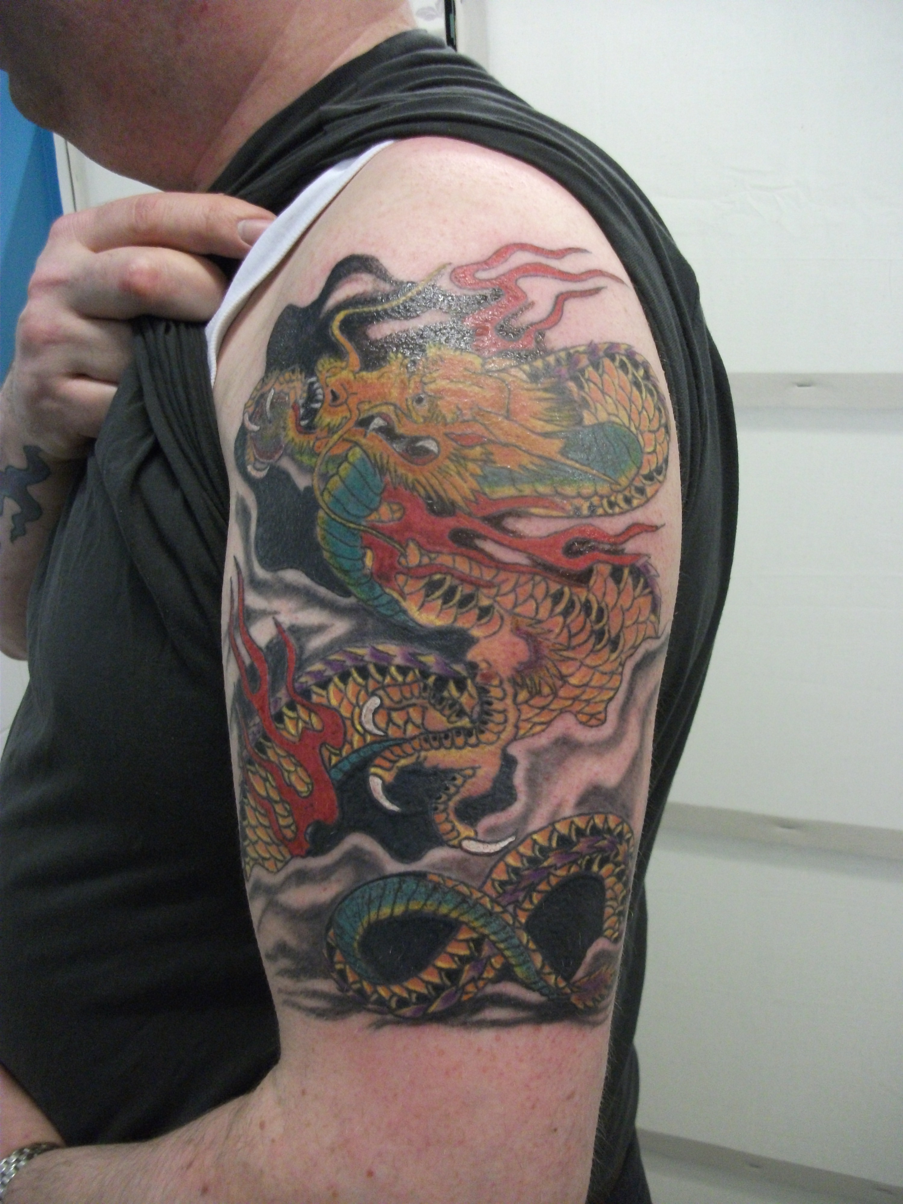 75 Dragon Tattoo Designs For Men and Women